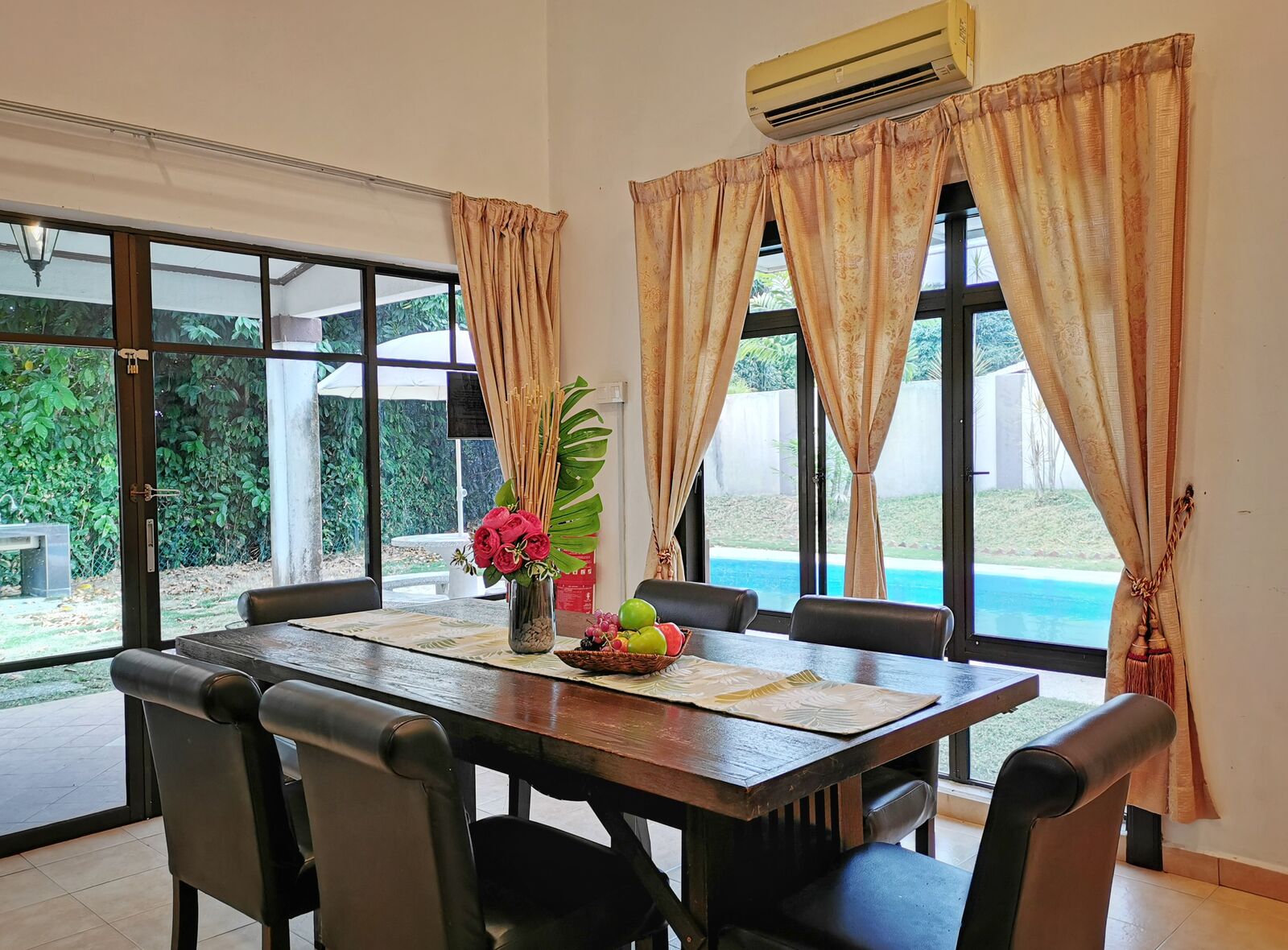 Friendship — 16 Pax Private Pool Villa, A'Famosa Dining table with pool view